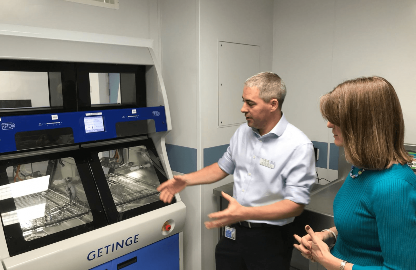 Dr Julian Berlet, Divisional Medical Director, shows Rachel state-of-the-art endoscopy decontamination equipment recently installed at the Alex.