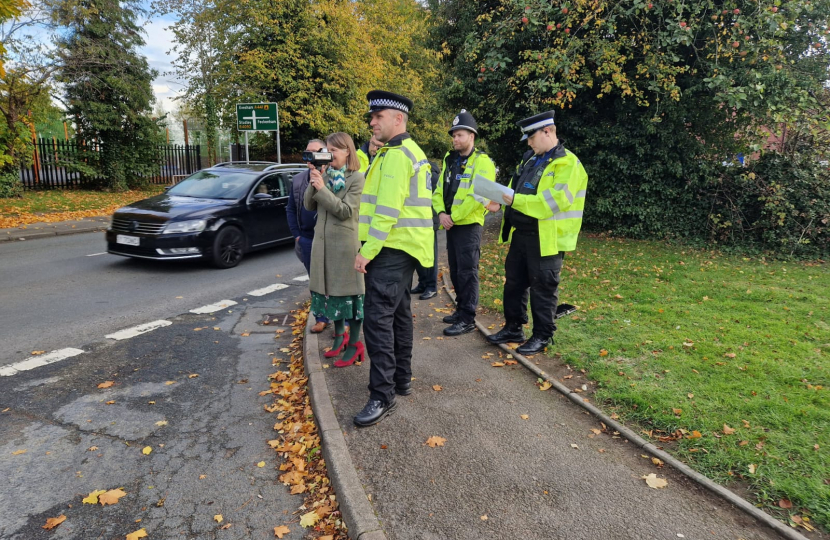 Rachel with local police officers conducting speed checks in Astwood Bank.
