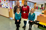Rachel and Cllr Karen Ashley with Grace and Julia from Abbeywood First School