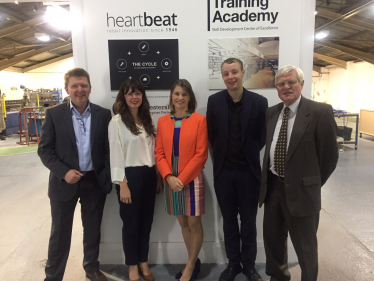 Rachel with management and staff at Heartbeat Manufacturing and Academy in the company of Redditch borough and Worcestershire county councillor Tom Baker-Price (second right)