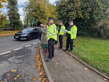 Rachel with local police officers conducting speed checks in Astwood Bank.